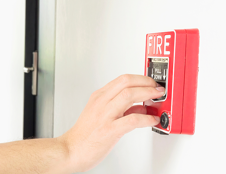 a hand push fire alarm